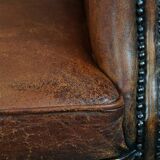 Vintage sheep leather wingback chair