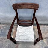 Scandinavian chair in wood and woven natural fibre.