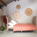 Carved wooden bench and caning bed
