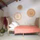 Lit banquette en bois sculpté et cannage