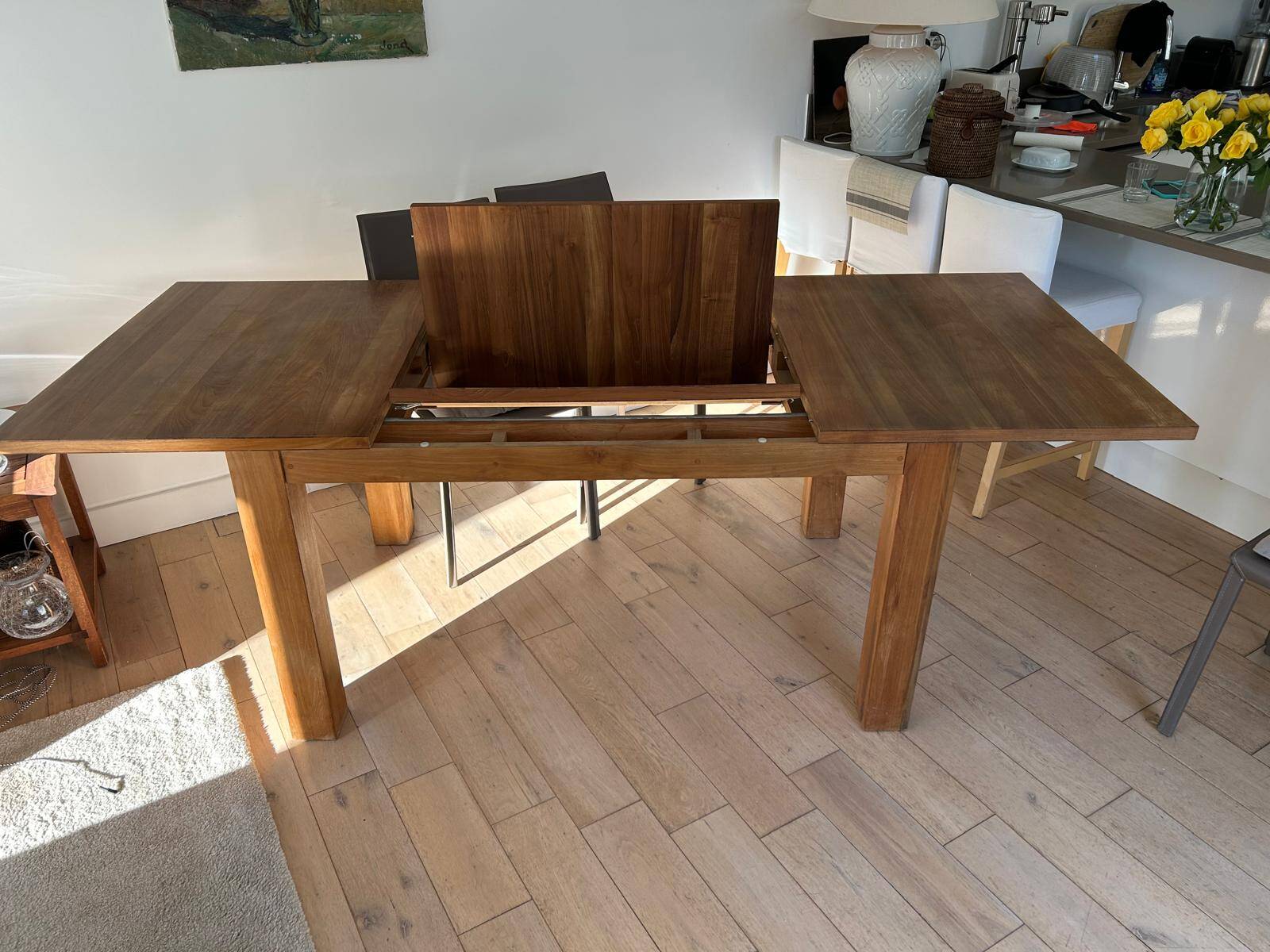 Ethnicraft teak dining table with slice extension