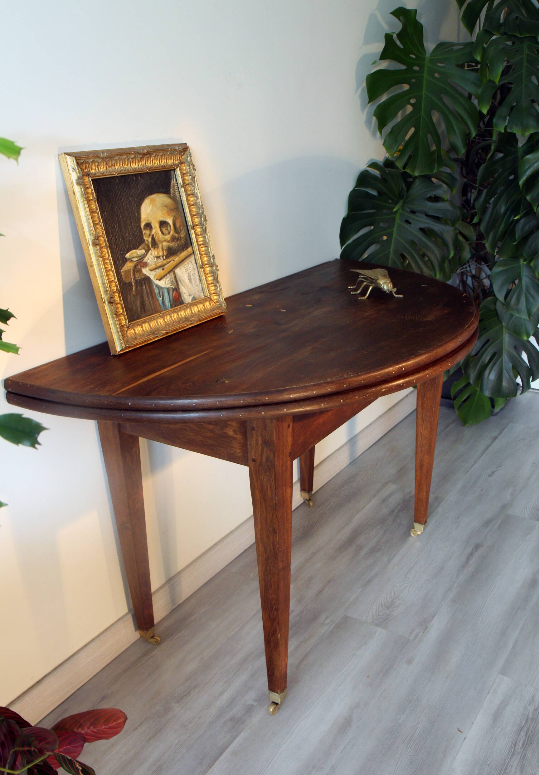 Antique half-moon oak table