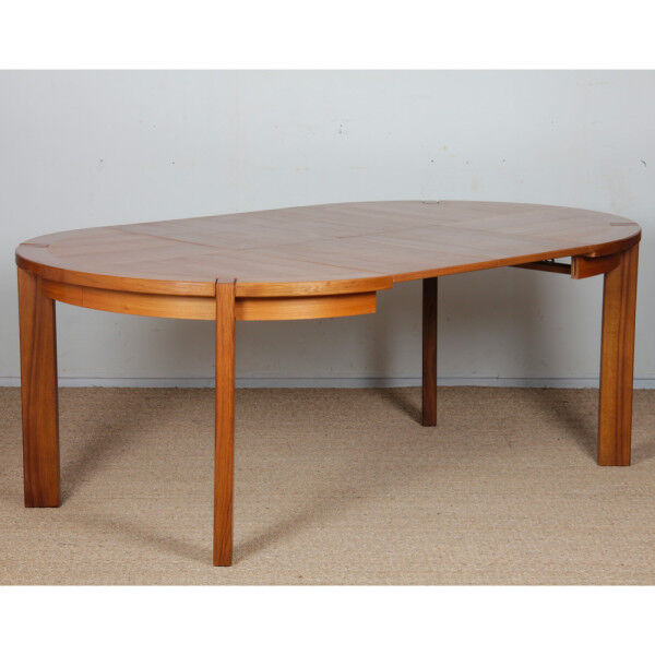Round extendable dining table in wood published by Monopoly, 1970.