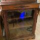 Two-part cabinet, recessed and with a glass-fronted display case, in Indian rosewood, circa 1850/60