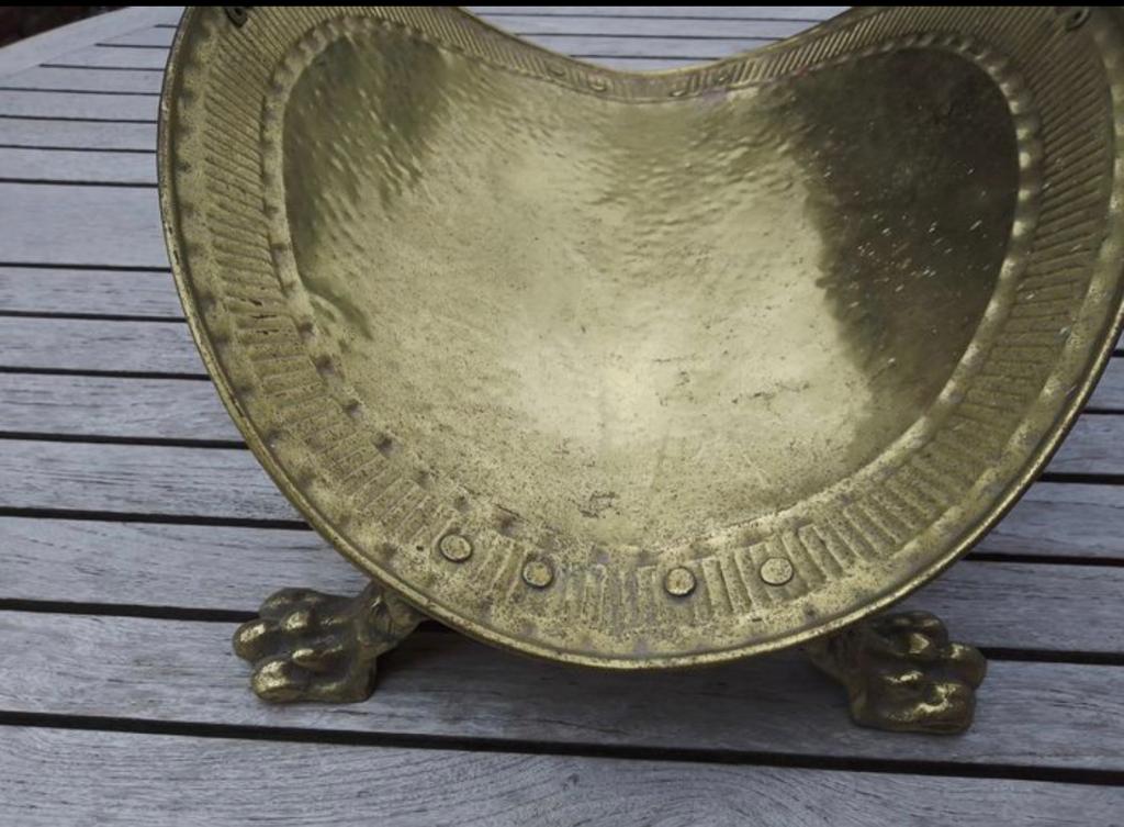 Old brass log holder