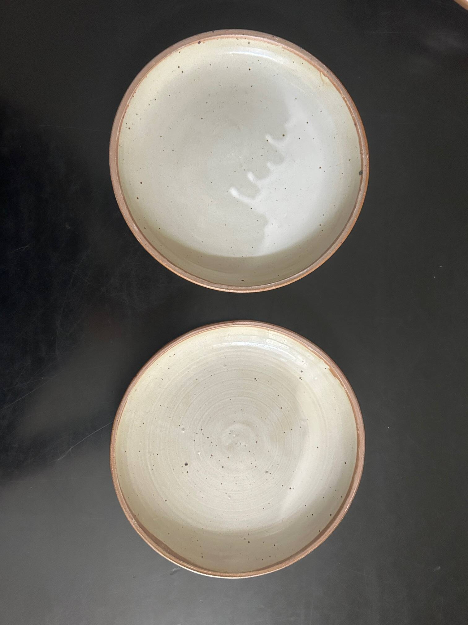 7 stoneware plates 1970