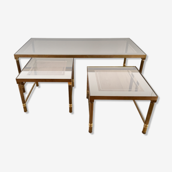 Pull-out coffee table in brass and smoked glass