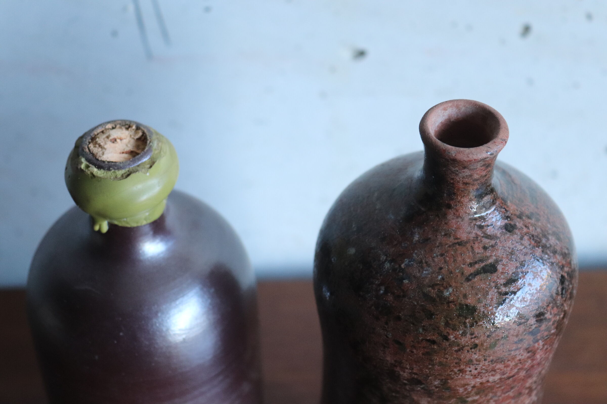 2 vintage ceramic bottles