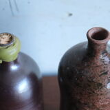 2 vintage ceramic bottles