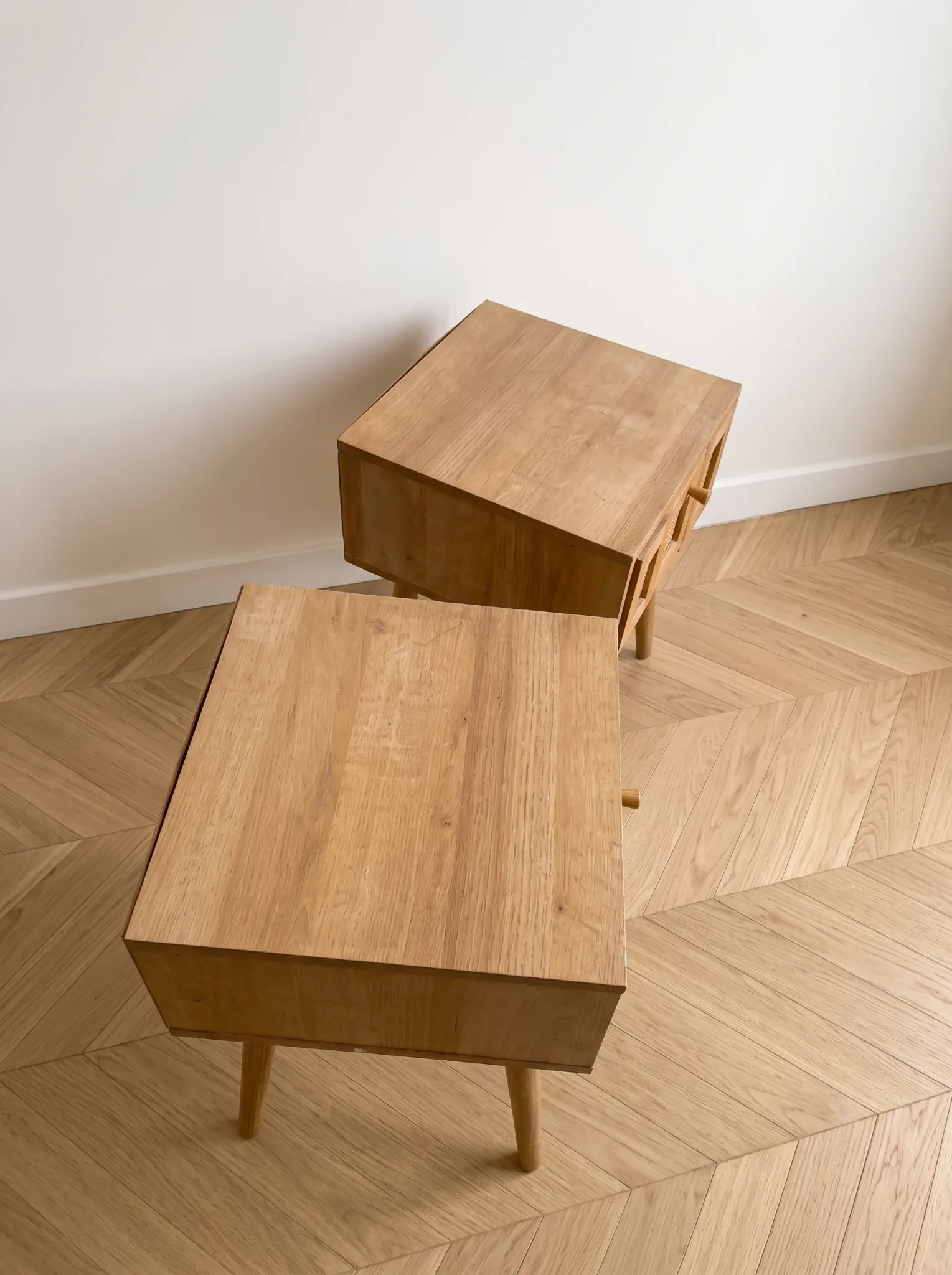 Pair of wooden and cane bedside tables, 1950s