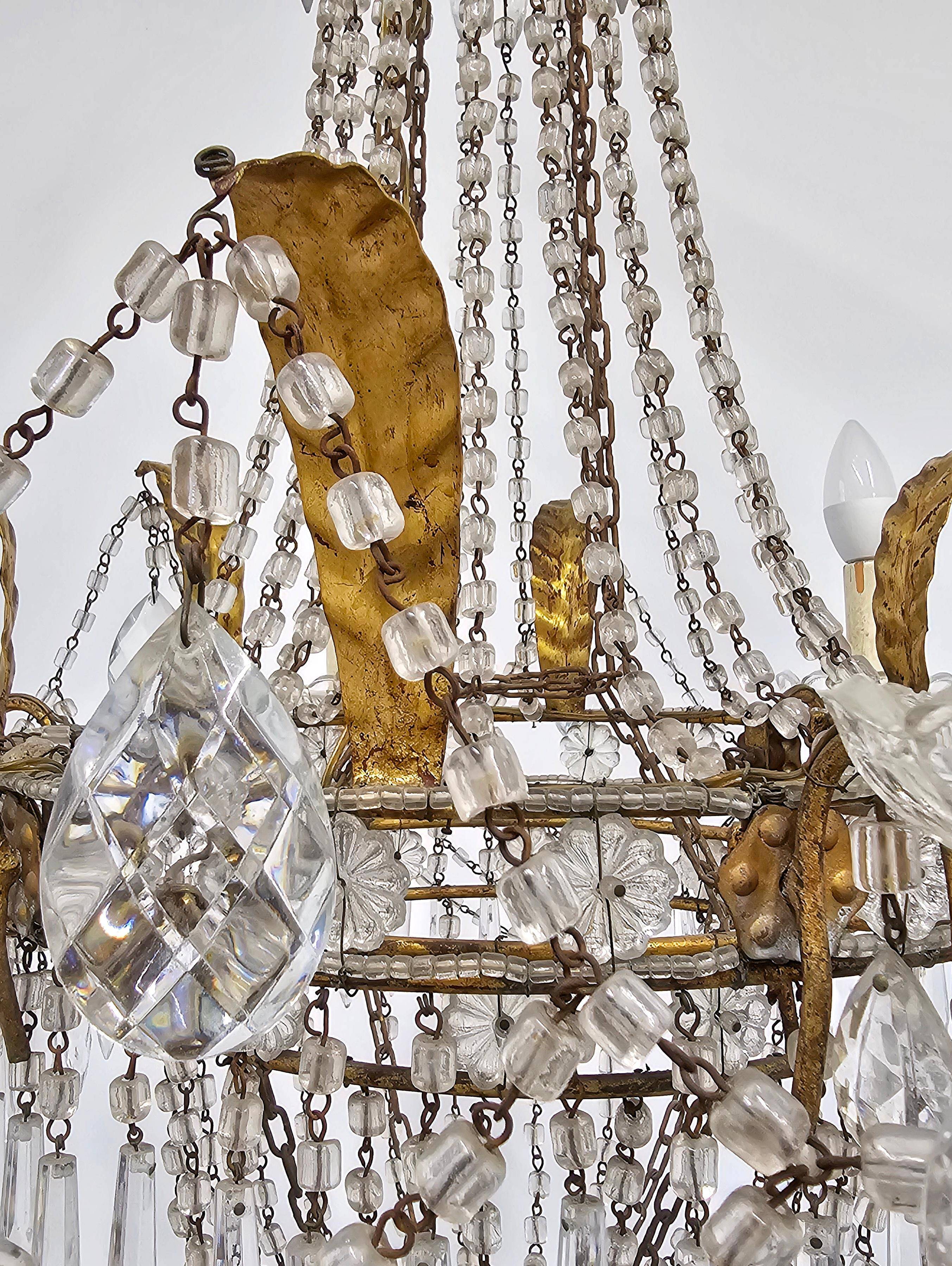 Antique crystal chandelier with floral details 1910