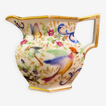Old Paris porcelain milk jug with polychrome and gold bird floral decoration