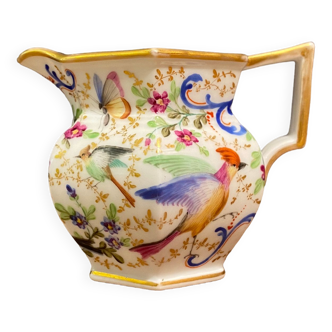 Old Paris porcelain milk jug with polychrome and gold bird floral decoration