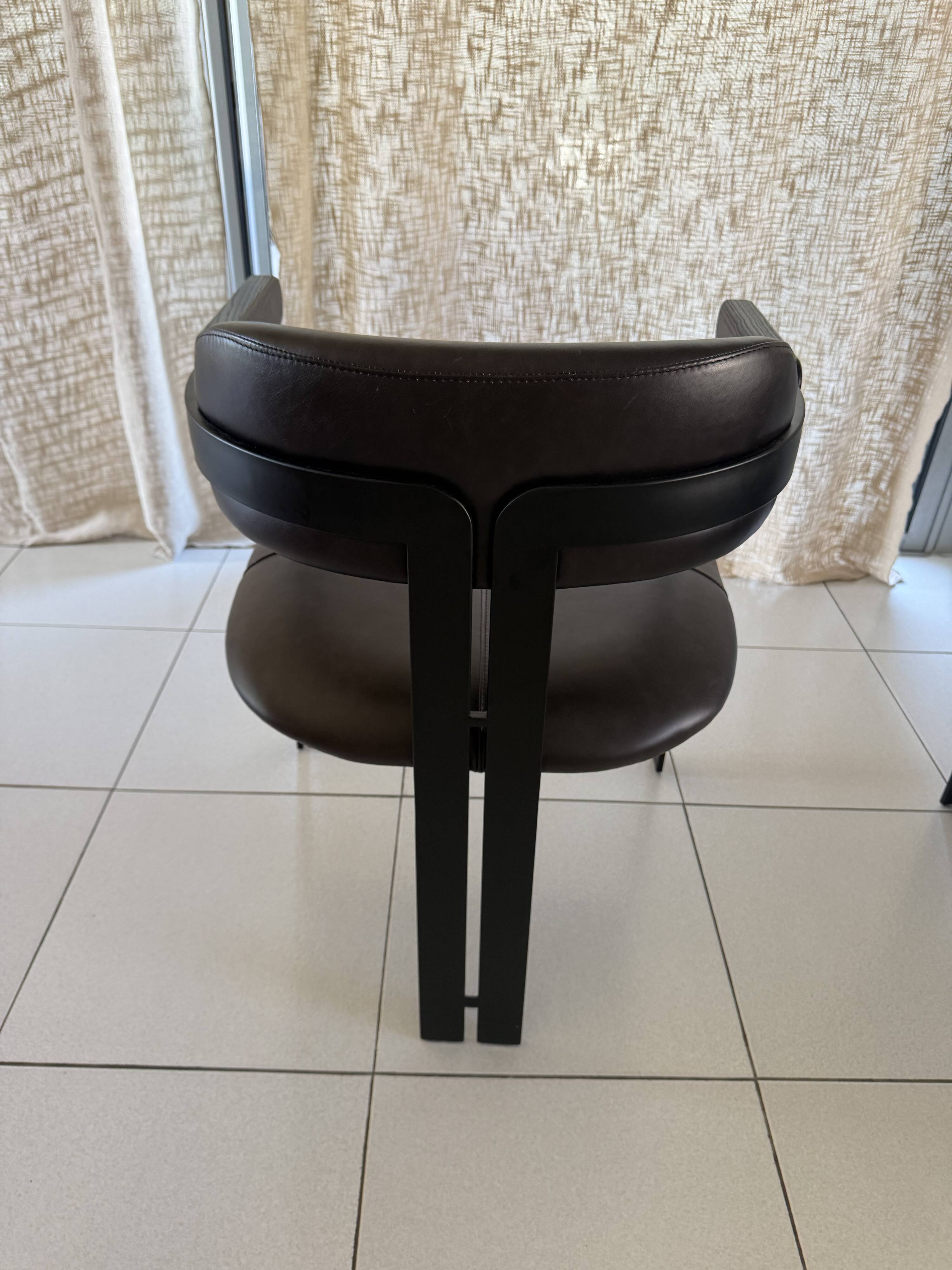Set of 2 black leather and metal armchairs