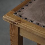 A pair of antique Danish pine stools from the late 19th century.