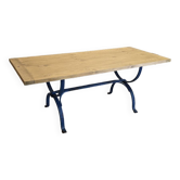 Wrought iron and solid wood table