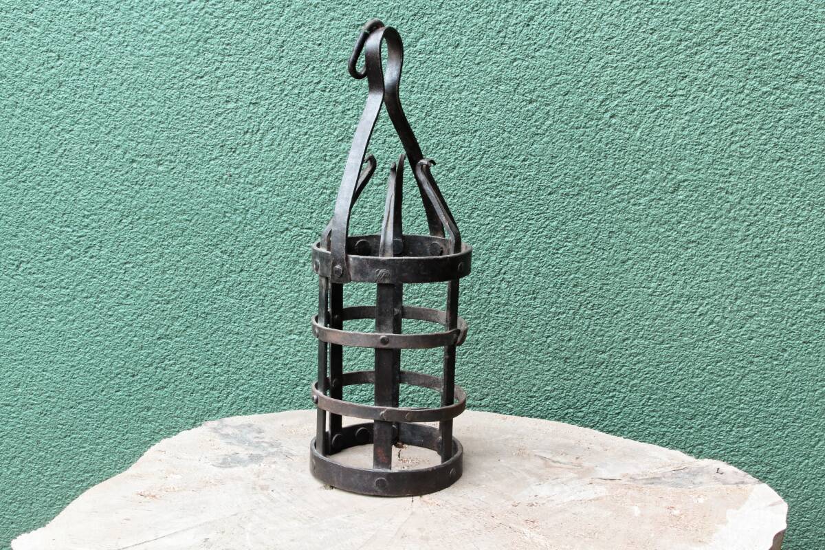 Riveted wrought iron cage suspension