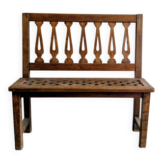 Old church bench in pitch pine, rustic charm and authentic patina.