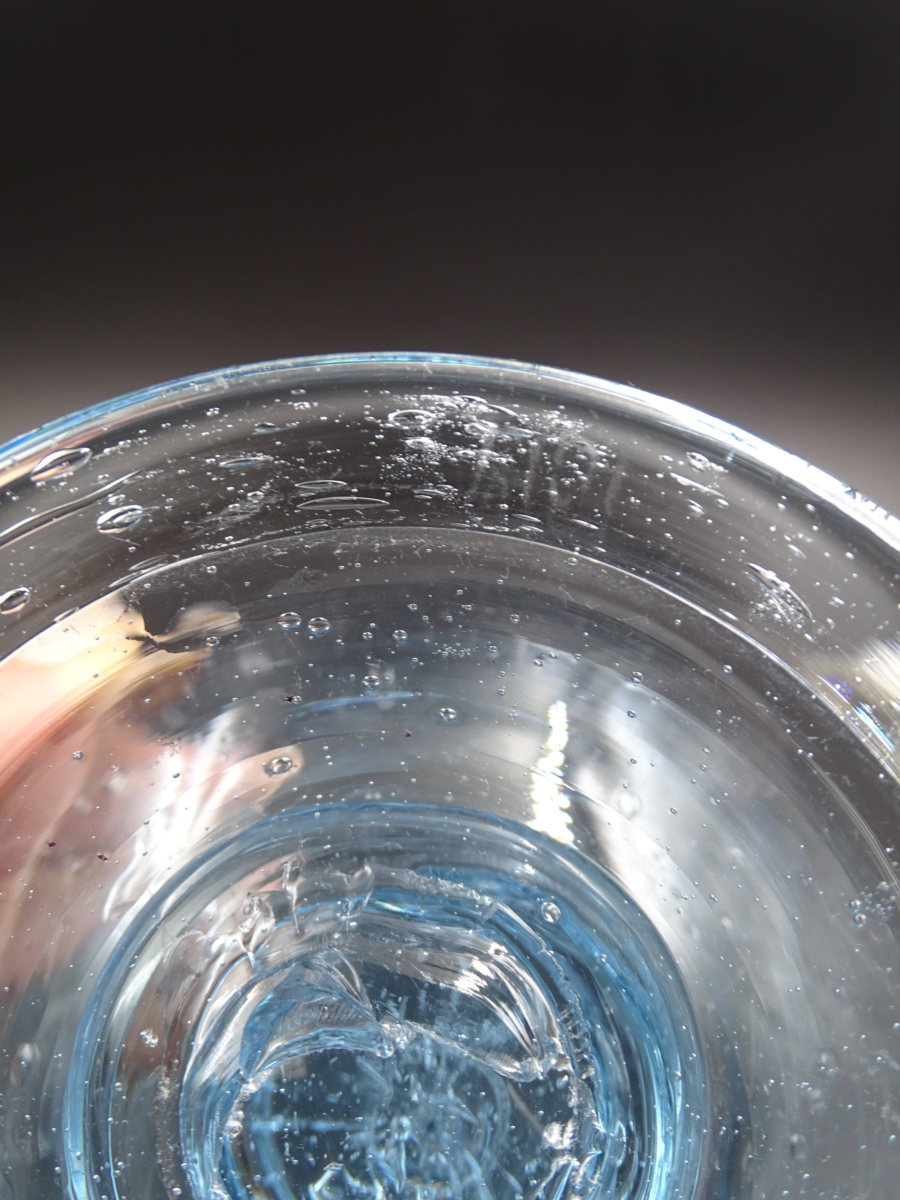 Candlestick or photophore in sky blue bulled glass, signed Biot