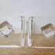 Pair of solid plexiglass bookends, faceted cubes, 1980s