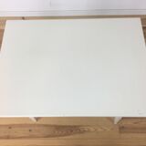 White wood desk foot compass