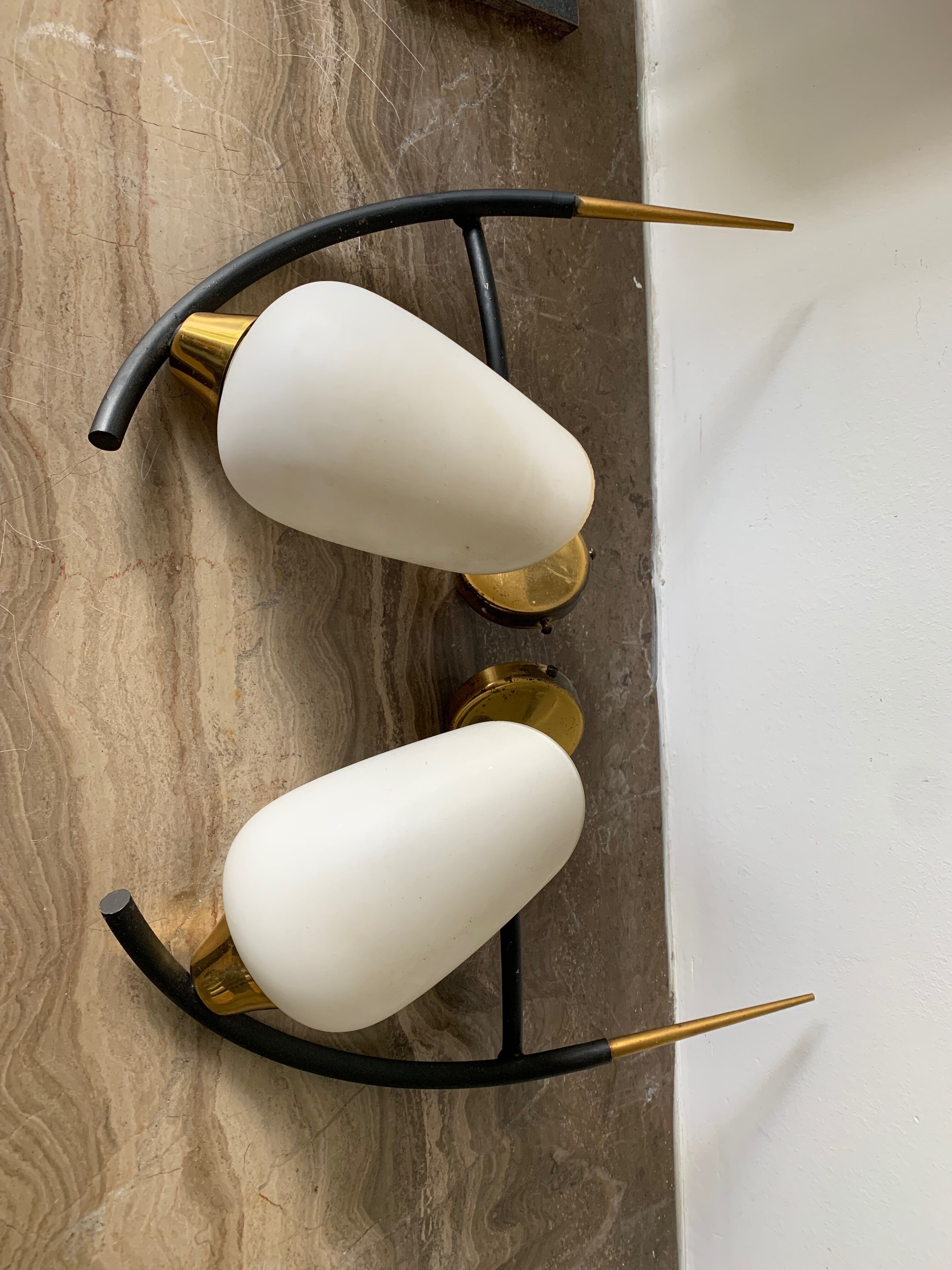 Opaline brass symmetrical and black horn-shaped laqué tube sconces