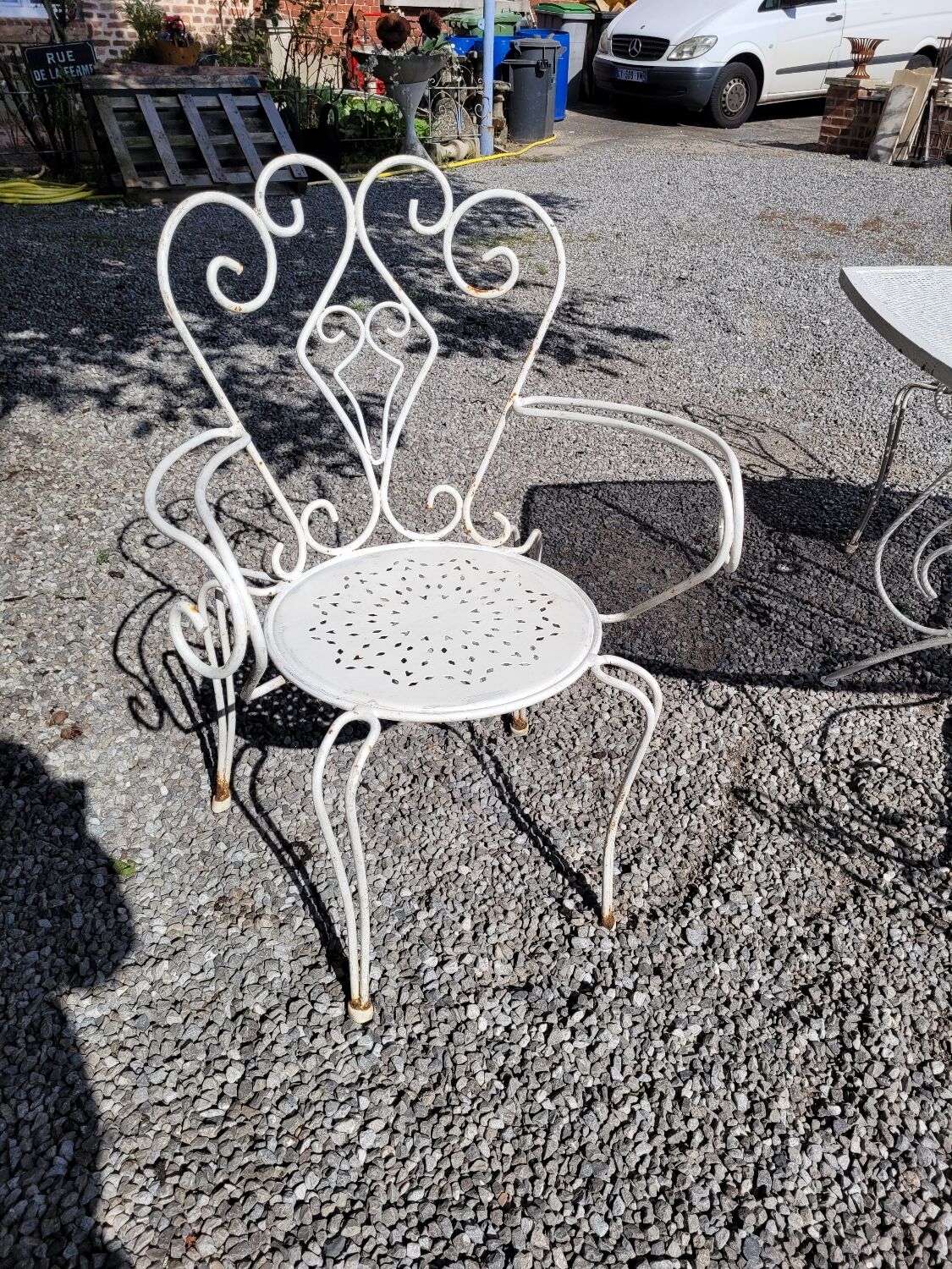 Old wrought iron garden furniture, table + 2 armchairs + 2 chairs