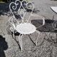 Old wrought iron garden furniture, table + 2 armchairs + 2 chairs