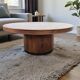 Vintage round wooden coffee table with a copper top.