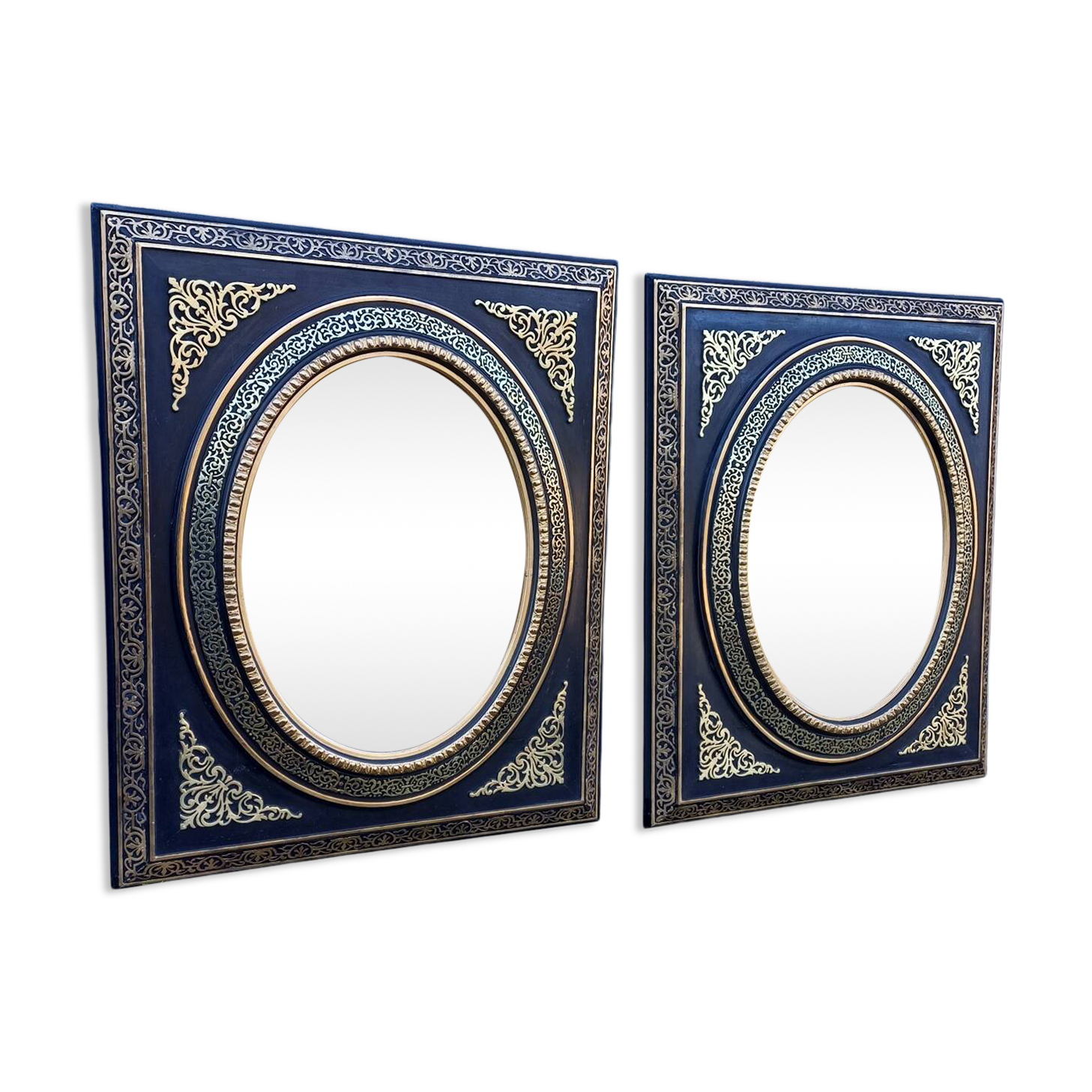 Pair of antique mirrors from the Napoléon III period, black and gilded.