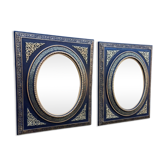 Pair of antique mirrors from the Napoléon III period, black and gilded.