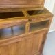 Large antique haberdashery cabinet with glass doors.