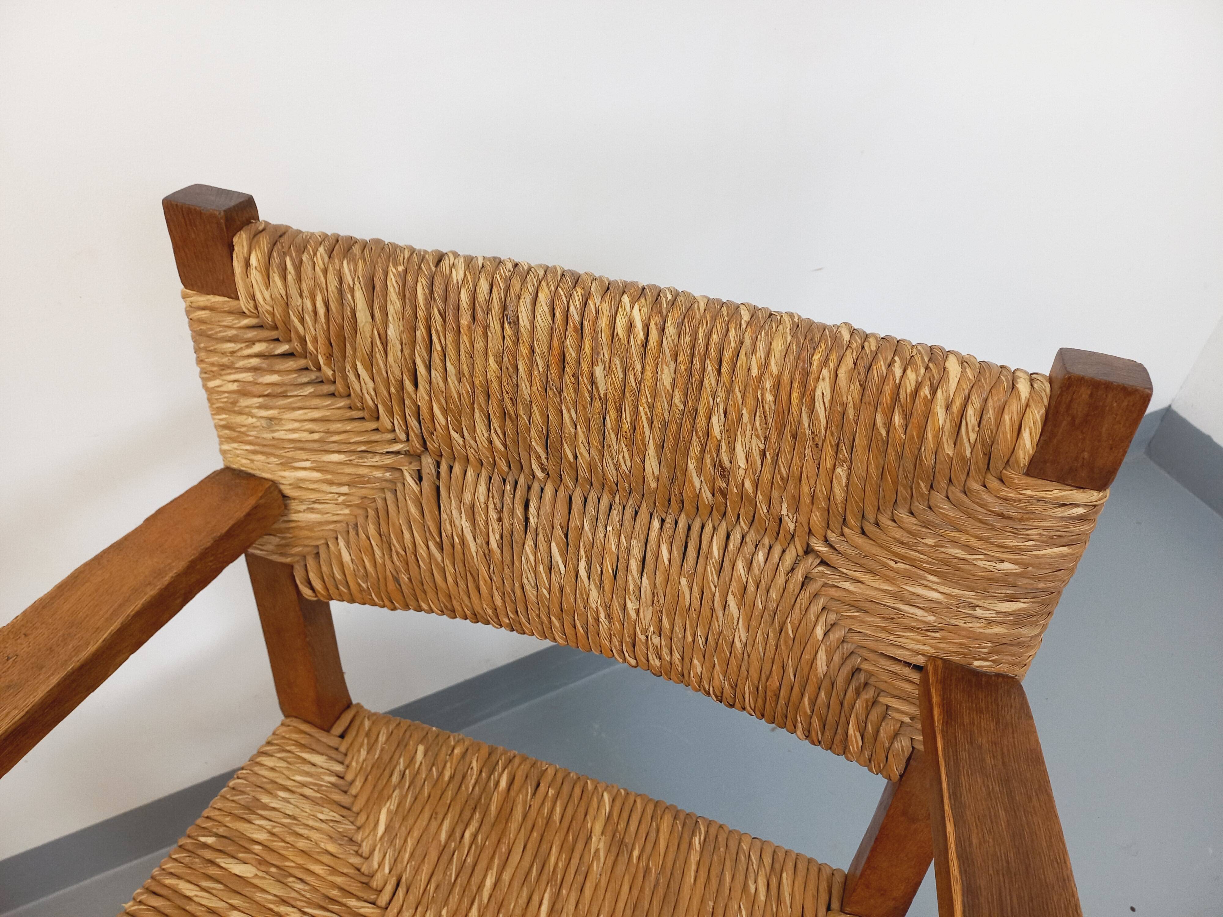 Set of 2 vintage brutalist armchairs in oak wood and straw