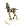 Brass donkey statue on marble