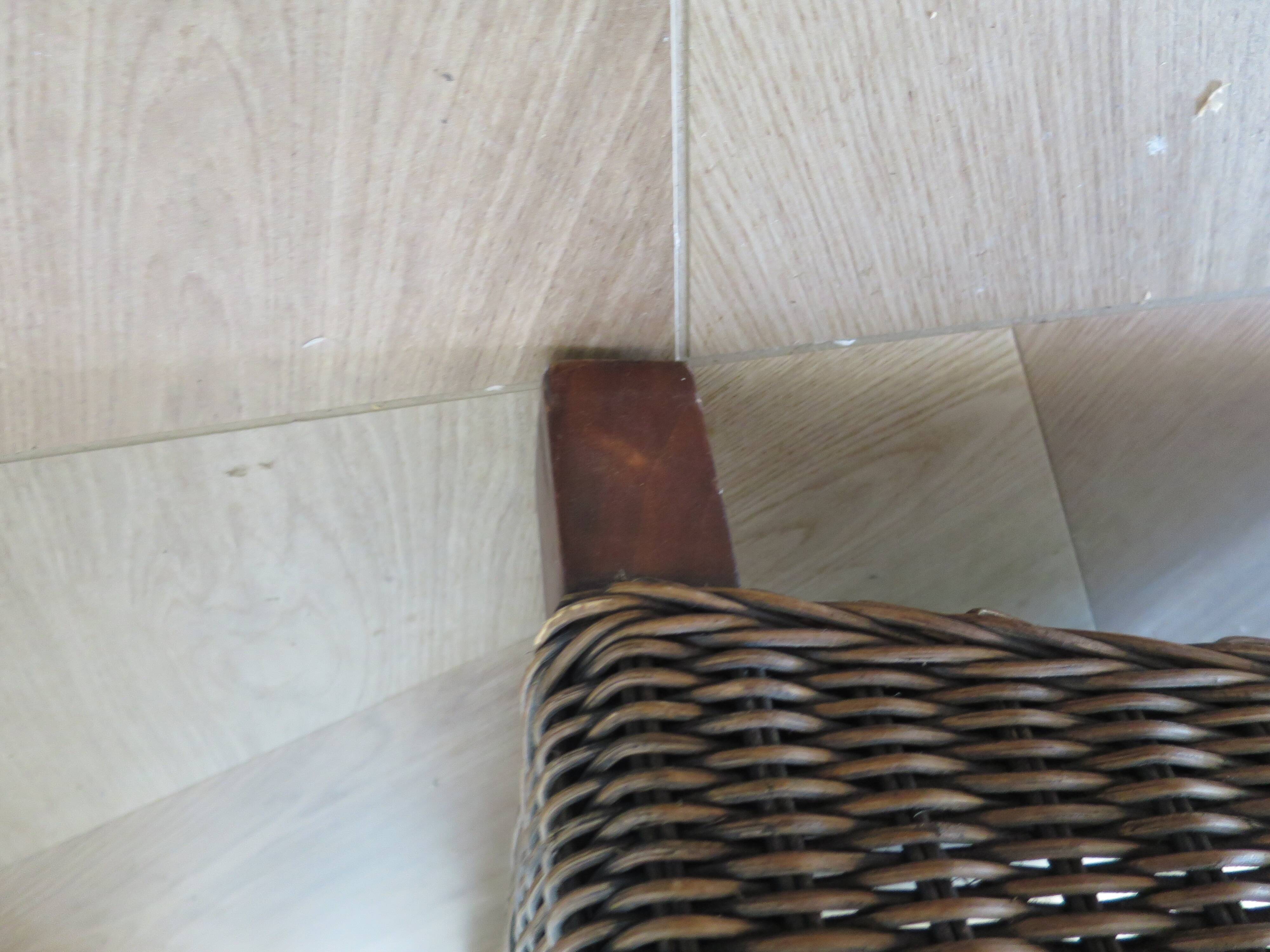 2 armchairs in woven rattan and wood, 1980s