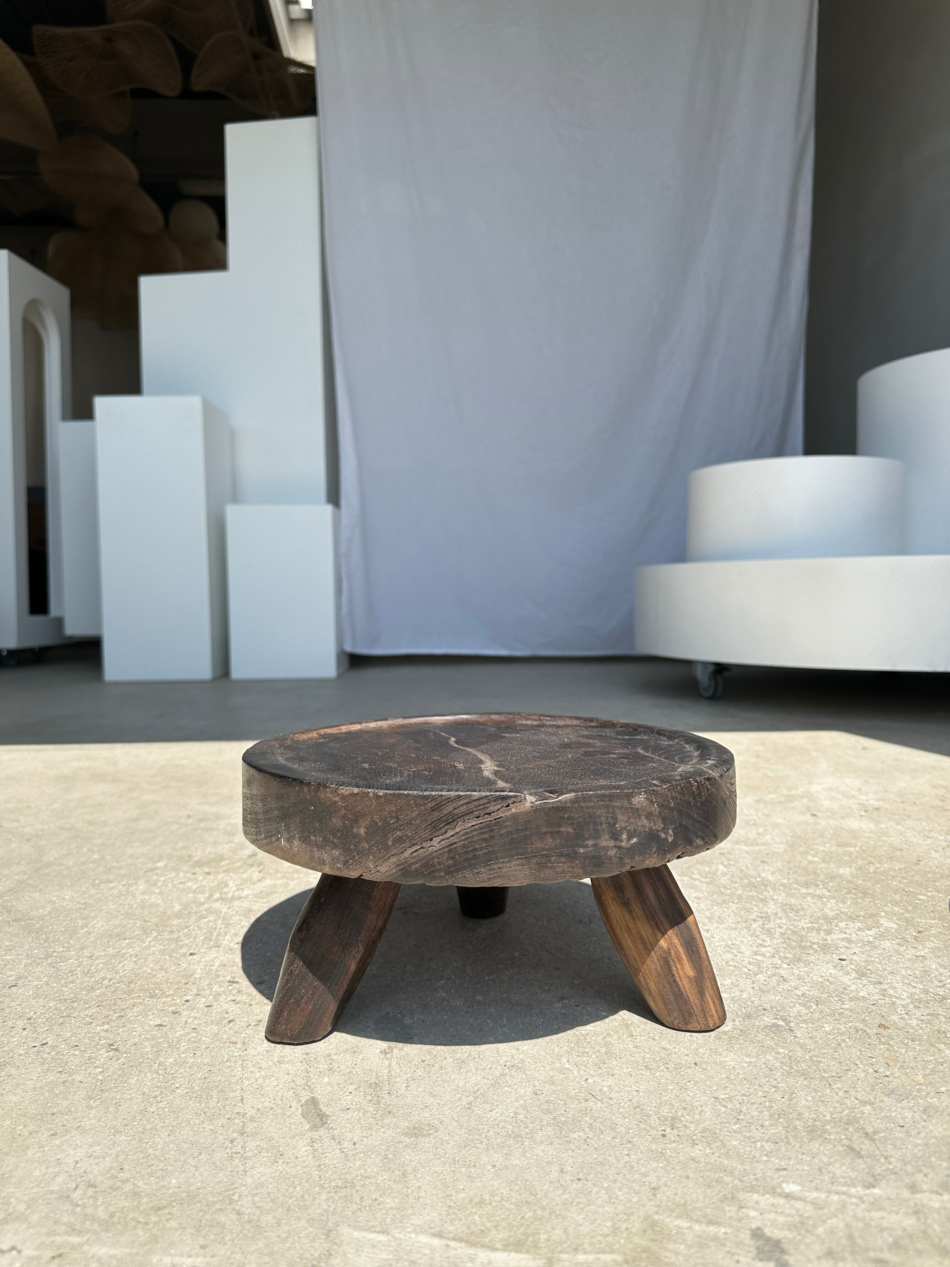Small tripod stool low in dark brown upcycled teak