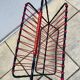 Scoubidou and wrought iron magazine rack