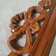 Wooden hanging mirror with vintage carved knot