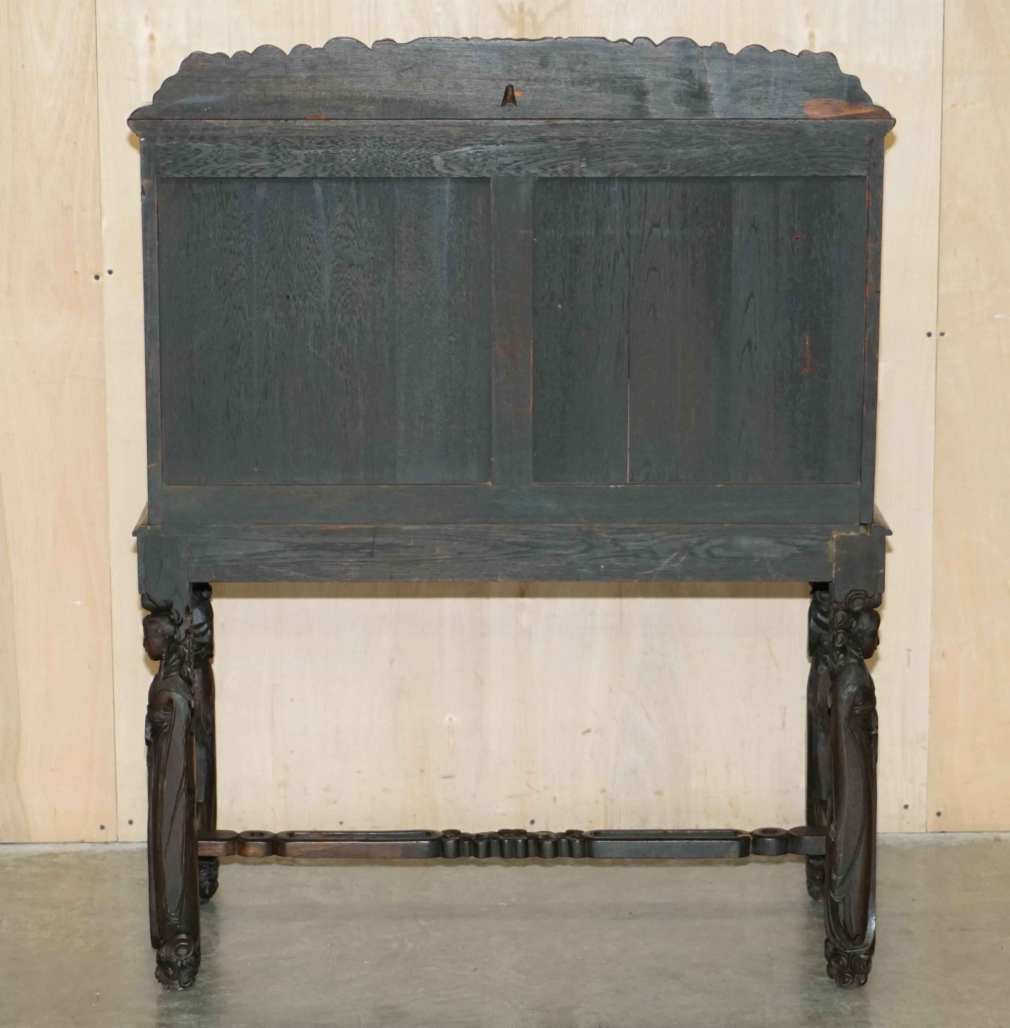 Chinese hand-carved desk from around 1940 with matching chair.