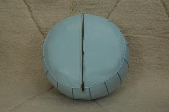 Moroccan pouf in sky blue leather