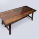 Brutalist table designed by Georges Robert in stained pine. France, 1960.