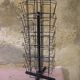 Black metal postcard turnstile display