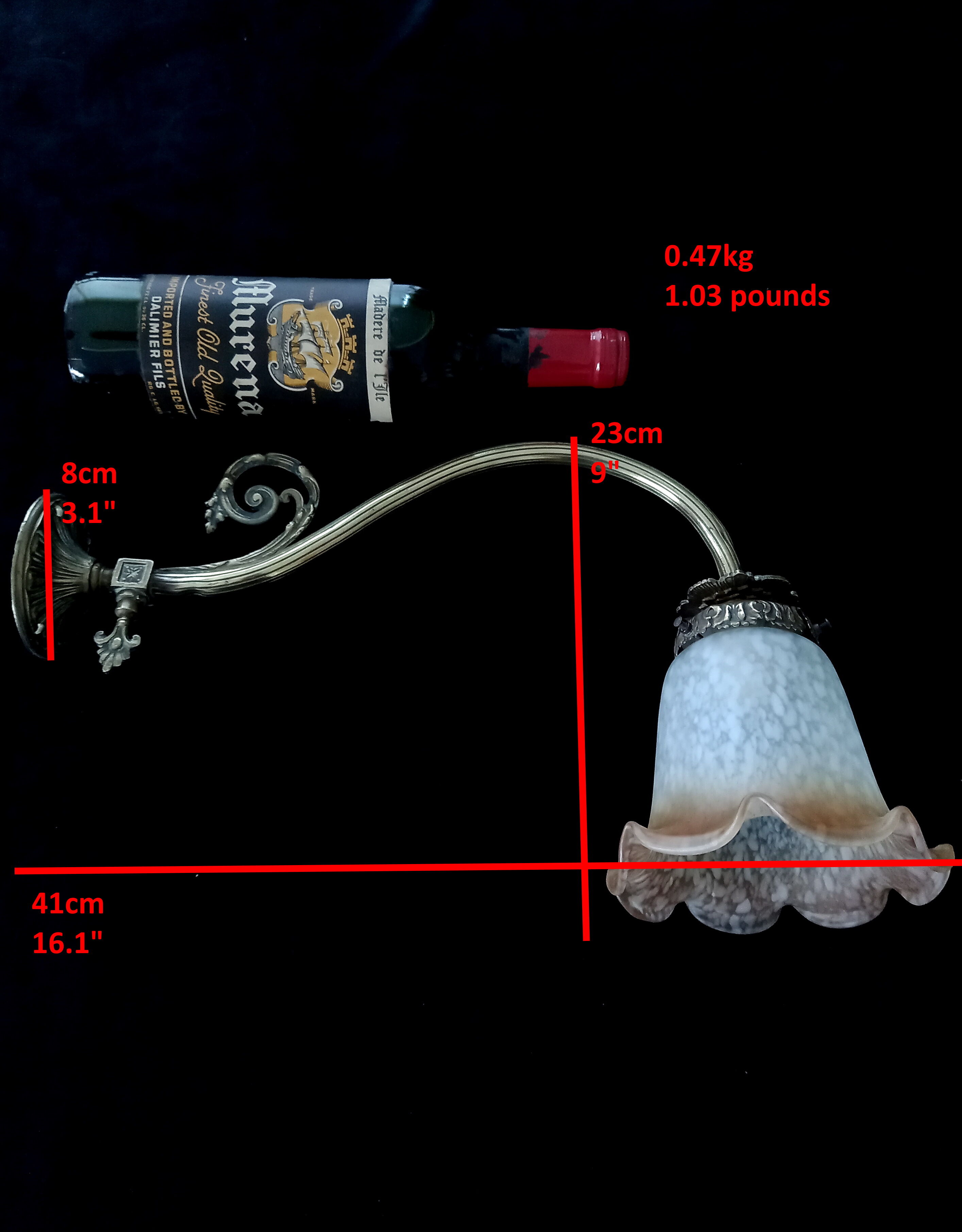 Brass wall lamp with speckled glass tulip