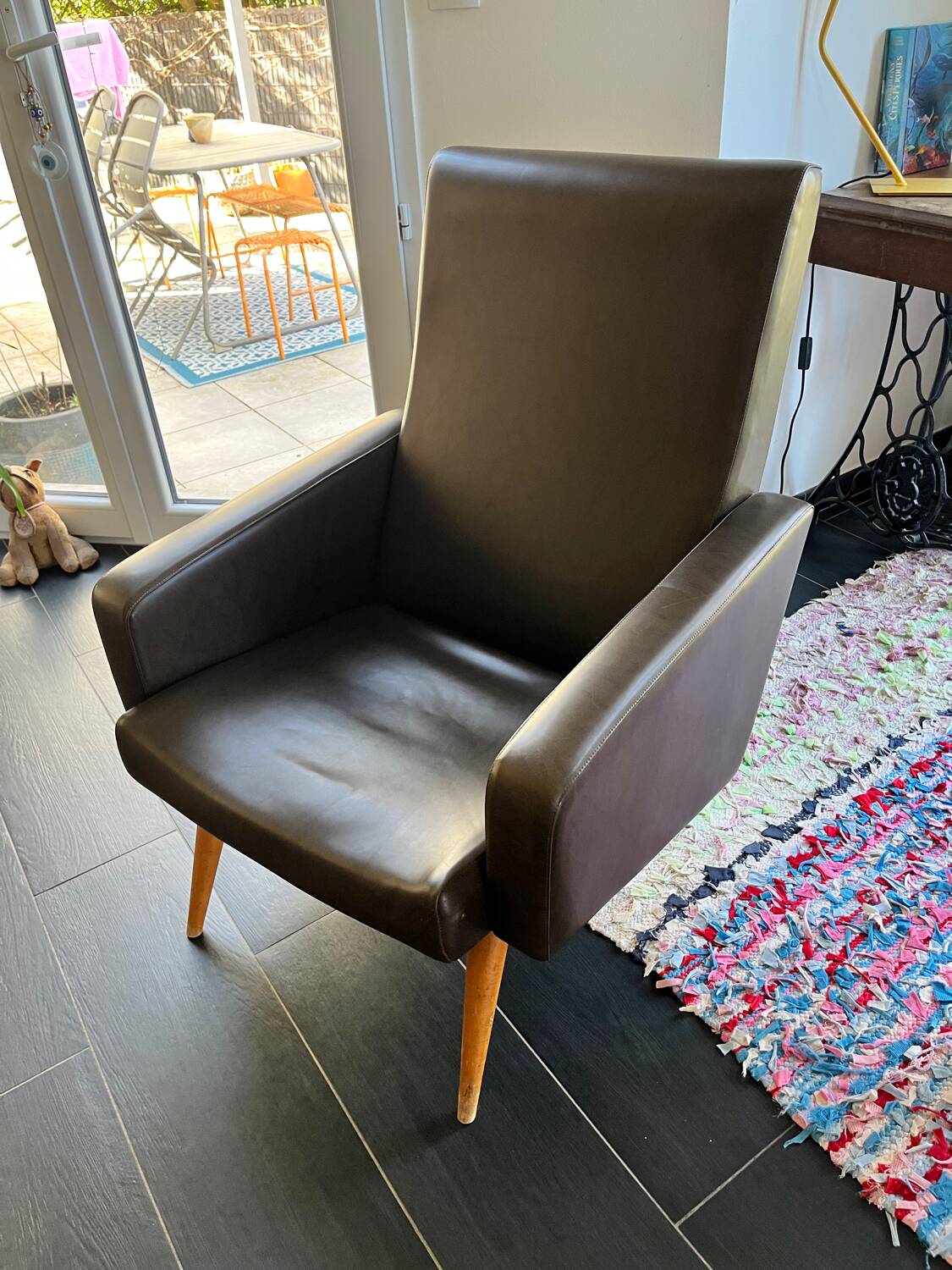 Vintage brown faux leather armchair from the 60s/70s.