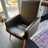 Vintage brown faux leather armchair from the 60s/70s.