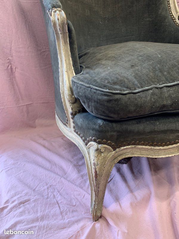 Green velvet shepherdess armchair