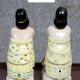 Pair of polychrome porcelain night light statues in Art Nouveau style