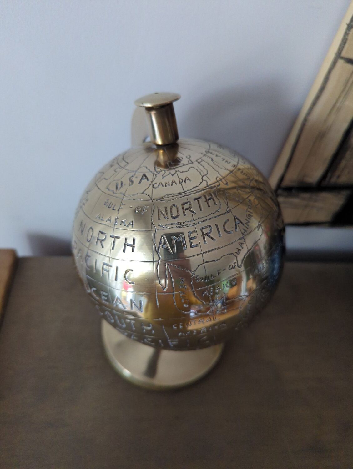 Vintage gilded brass world map