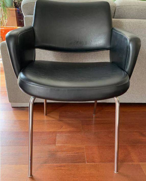 Black leatherette conference armchair