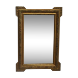 Mirror with gilded wood and stucco frame, early 20th century, 59x83cm